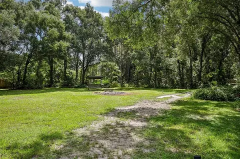 Exterior - 33245 Mandrake Rd, Wesley Chapel, FL 33543 photo 9 of 16