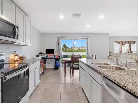 Kitchen - 16636 Windmill Forge Pass, Wimauma, FL 33598 photo 3 of 4