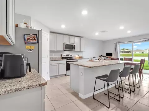 Kitchen - 16636 Windmill Forge Pass, Wimauma, FL 33598 photo 4 of 4