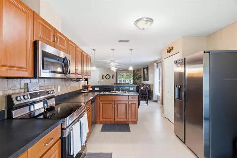 Kitchen - 15544 Florida Breeze Loop, Wimauma, FL 33598 photo 2 of 4