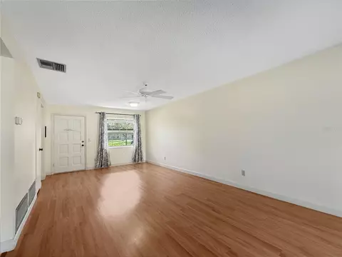 Living - 1701 Pinehurst Rd #2F, Dunedin, FL 34698 photo 6 of 7