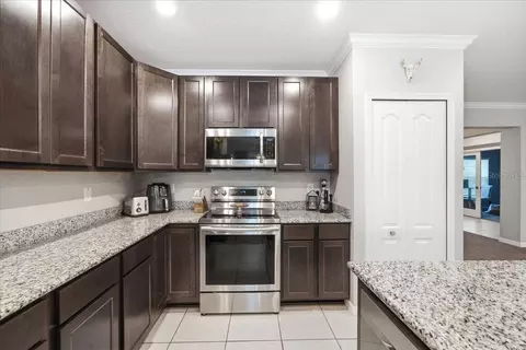 Kitchen - 15488 Scolder Loop, Weeki Wachee, FL 34614 photo 6 of 8