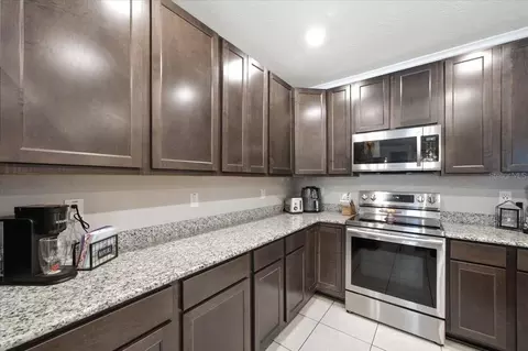 Kitchen - 15488 Scolder Loop, Weeki Wachee, FL 34614 photo 7 of 8