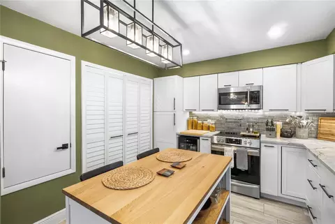 Kitchen - 656 Olympic Dr #17-3, Ocoee, FL 34761 photo 4 of 5