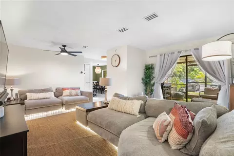 Living - 656 Olympic Dr #17-3, Ocoee, FL 34761 photo 2 of 3