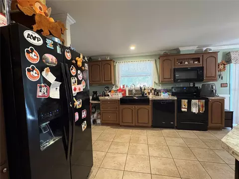 Kitchen - 7310 Riverview Dr, Riverview, FL 33578 photo 2 of 7