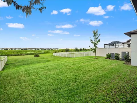 Exterior - 9594 Rally Spring Loop, Wesley Chapel, FL 33545 photo 3 of 12