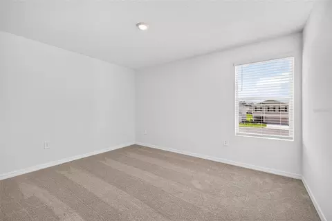 Bedroom - 12419 Gust Ct, Hudson, FL 34669 photo 4 of 8
