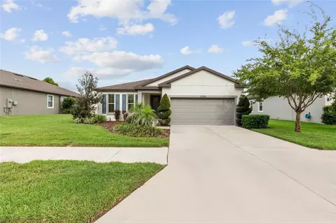 Exterior - 12386 Criollo Rd, Spring Hill, FL 34610 photo 4 of 11