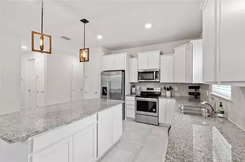 Kitchen - 12386 Criollo Rd, Spring Hill, FL 34610 photo 3 of 5