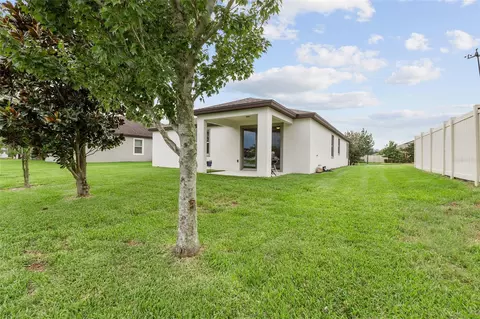 Exterior - 12386 Criollo Rd, Spring Hill, FL 34610 photo 2 of 11