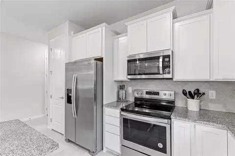 Kitchen - 12386 Criollo Rd, Spring Hill, FL 34610 photo 5 of 5