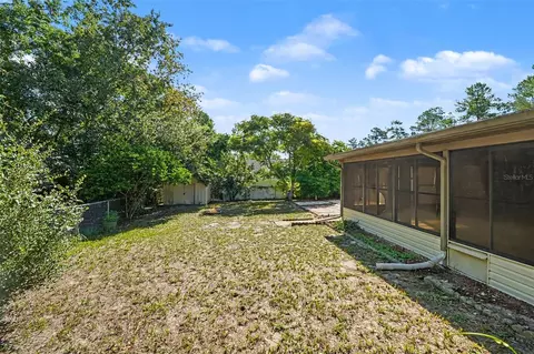 Exterior - 9661 Langan St, Spring Hill, FL 34606 photo 7 of 9