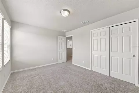 Bedroom - 5291 Meredrew Ln, Saint Cloud, FL 34771 photo 8 of 10