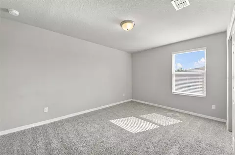 Bedroom - 5291 Meredrew Ln, Saint Cloud, FL 34771 photo 9 of 10