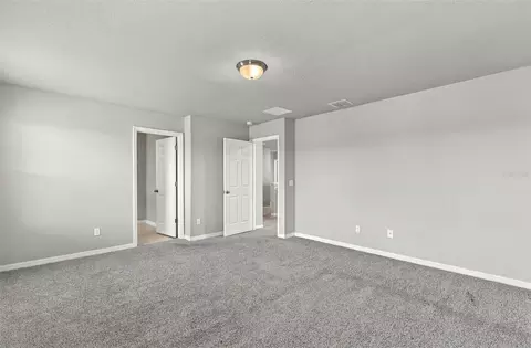 Bedroom - 5291 Meredrew Ln, Saint Cloud, FL 34771 photo 6 of 10