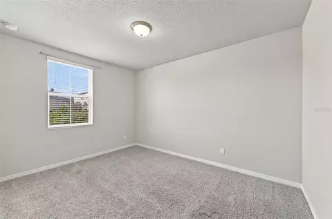 Bedroom - 5291 Meredrew Ln, Saint Cloud, FL 34771 photo 3 of 10