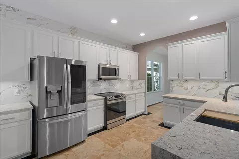 Kitchen - 4522 Mapletree Loop, Wesley Chapel, FL 33544 photo 5 of 6