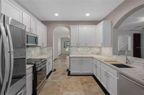 Kitchen - 4522 Mapletree Loop, Wesley Chapel, FL 33544 photo 4 of 6
