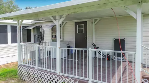Exterior - 19884 SE 110th Ct, Inglis, FL 34449 photo 5 of 9