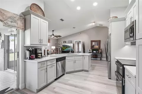 Kitchen - 8185 Rhanbuoy Rd, Spring Hill, FL 34606 photo 5 of 8
