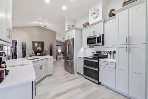 Kitchen - 8185 Rhanbuoy Rd, Spring Hill, FL 34606 photo 7 of 8