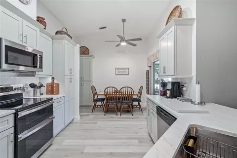 Kitchen - 8185 Rhanbuoy Rd, Spring Hill, FL 34606 photo 4 of 8