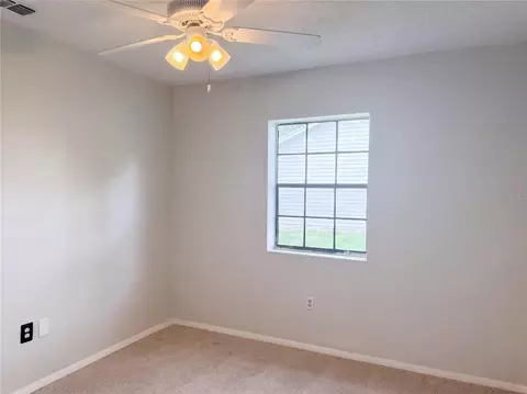 Bedroom - 3043 Cloudcroft Ave, Spring Hill, FL 34609 photo 9 of 12