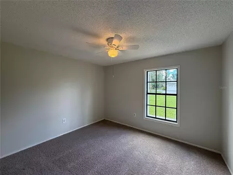 Bedroom - 3043 Cloudcroft Ave, Spring Hill, FL 34609 photo 7 of 12