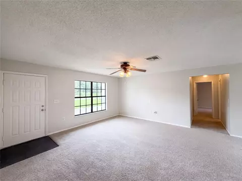 Living - 3043 Cloudcroft Ave, Spring Hill, FL 34609 photo 2 of 9