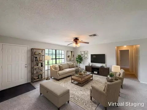 Living - 3043 Cloudcroft Ave, Spring Hill, FL 34609 photo 1 of 9