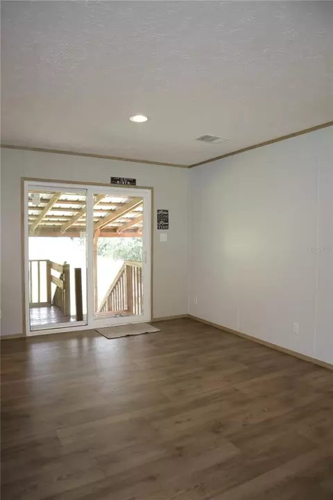 Living - 6443 Finance Ave, Weeki Wachee, FL 34607 photo 2 of 4