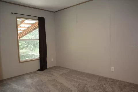 Bedroom - 6443 Finance Ave, Weeki Wachee, FL 34607 photo 3 of 7