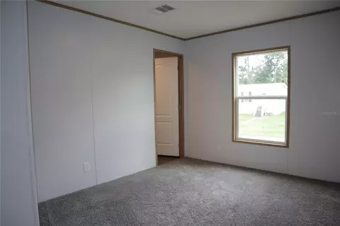 Bedroom - 6443 Finance Ave, Weeki Wachee, FL 34607 photo 6 of 7
