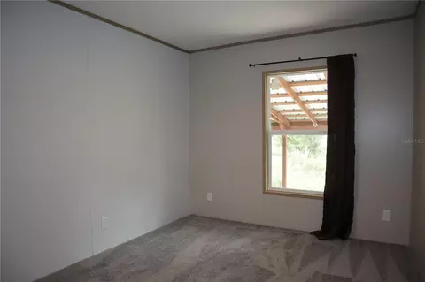 Bedroom - 6443 Finance Ave, Weeki Wachee, FL 34607 photo 4 of 7