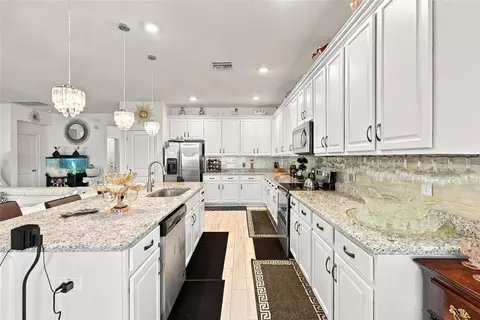 Kitchen - 944 Old Windsor Way, Spring Hill, FL 34609 photo 2 of 2