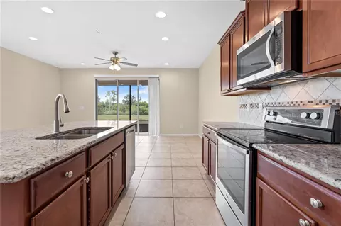 Kitchen - 8961 Turnstone Haven Pl, Tampa, FL 33619 photo 3 of 5