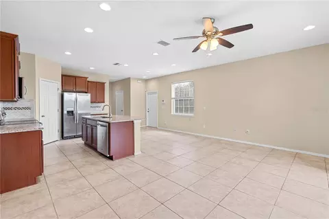 Living - 8961 Turnstone Haven Pl, Tampa, FL 33619 photo 2 of 7