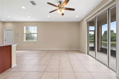 Living - 8961 Turnstone Haven Pl, Tampa, FL 33619 photo 5 of 7
