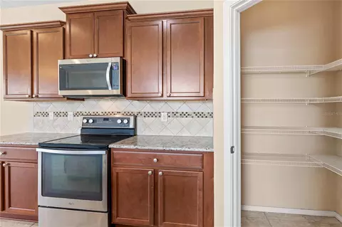 Kitchen - 8961 Turnstone Haven Pl, Tampa, FL 33619 photo 5 of 5