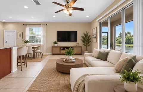 Living - 8961 Turnstone Haven Pl, Tampa, FL 33619 photo 4 of 7
