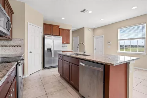 Kitchen - 8961 Turnstone Haven Pl, Tampa, FL 33619 photo 4 of 5