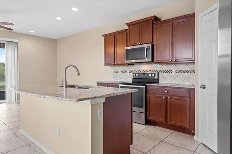 Kitchen - 8961 Turnstone Haven Pl, Tampa, FL 33619 photo 2 of 5