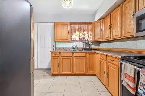 Kitchen - 500 E 40th St, Hialeah, FL 33013 photo 1 of 2