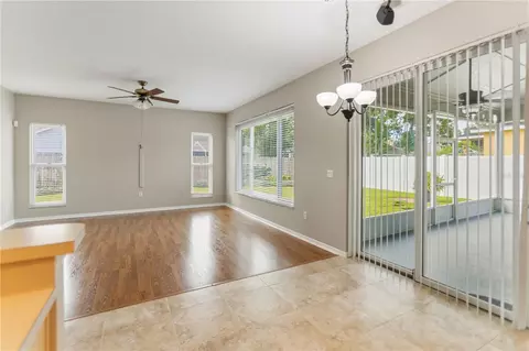 Living - 28402 Openfield Loop, Wesley Chapel, FL 33543 photo 12 of 13
