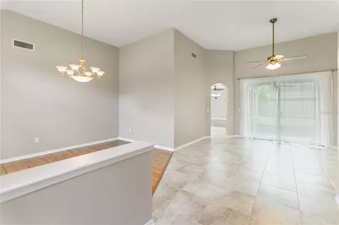 Living - 28402 Openfield Loop, Wesley Chapel, FL 33543 photo 3 of 13