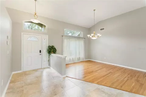 Living - 28402 Openfield Loop, Wesley Chapel, FL 33543 photo 7 of 13