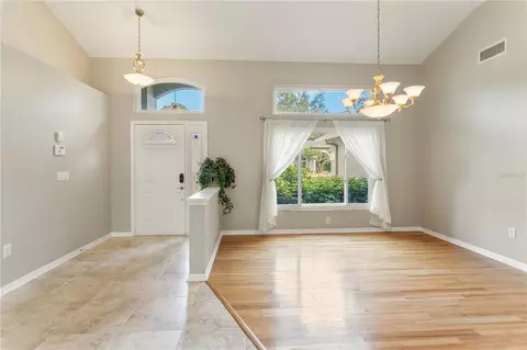 Living - 28402 Openfield Loop, Wesley Chapel, FL 33543 photo 2 of 13