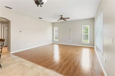 Living - 28402 Openfield Loop, Wesley Chapel, FL 33543 photo 11 of 13