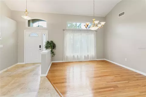 Living - 28402 Openfield Loop, Wesley Chapel, FL 33543 photo 5 of 13